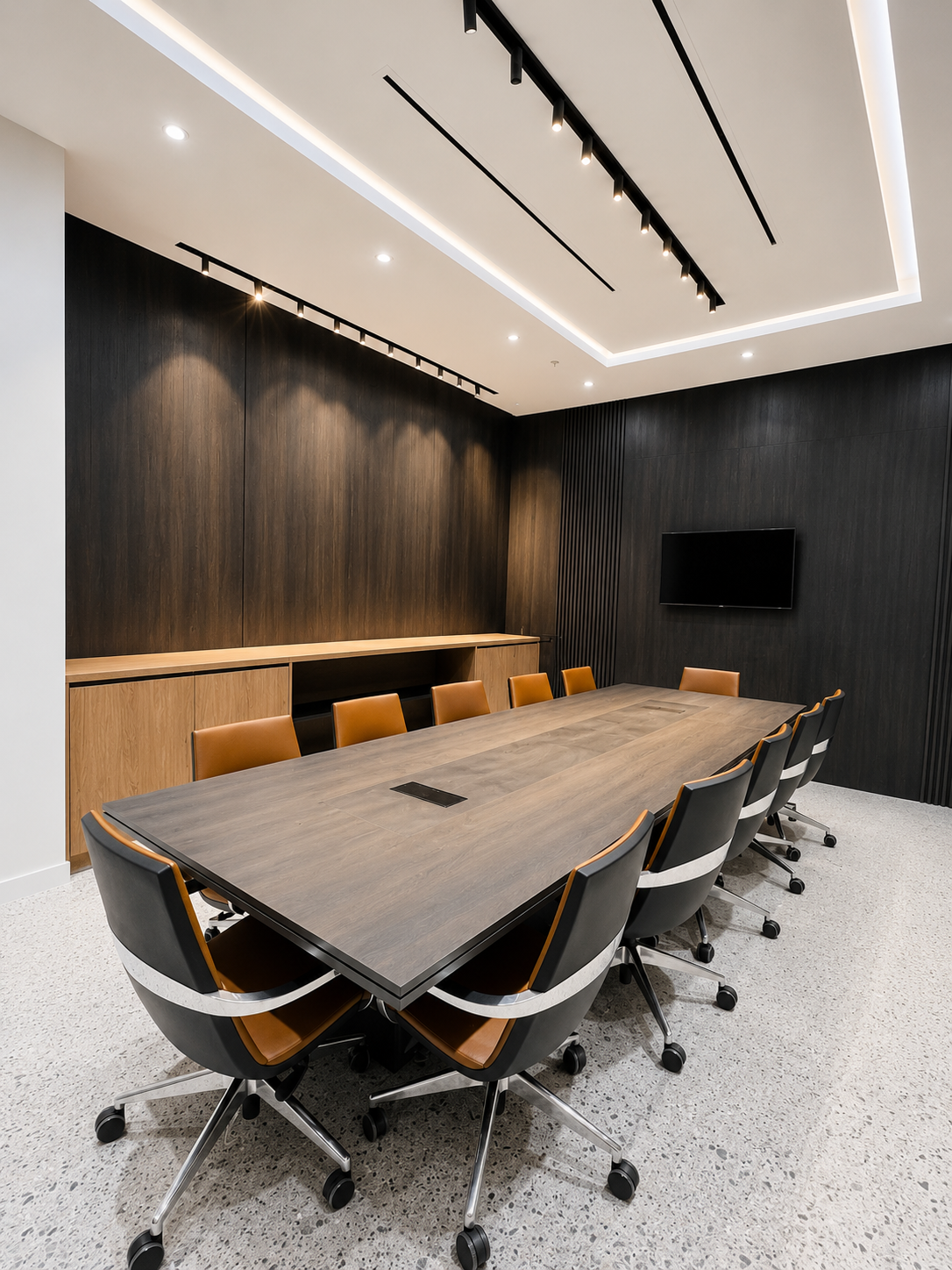 Executive boardroom with walnut wall and leather seating